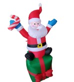 Pascuero Inflable 1.80 metros con luz interior sobre regalo